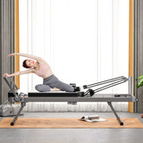 Foldable Pilates Reformer Bed with Adjustable Resistance for Home Workouts Black