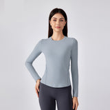 Second-Skin Fitted Long-Sleeve Yoga Top – Stretch, Sculpt, and Comfort for Pilates and Training